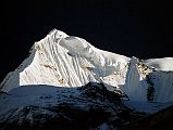 403 Singu Chiuli, Fluted Peak From Annapurna Sanctuary Base Camp Singu Chiuli (Fluted Peak, 6501m) shone brilliantly above Annapurna Sanctuary Base Camp.